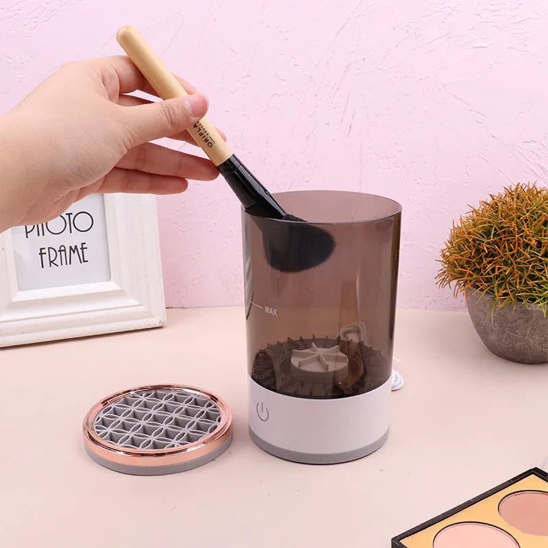 Electric makeup brush cleaner in grey and white, 17x9x9 cm, with USB charger and brush