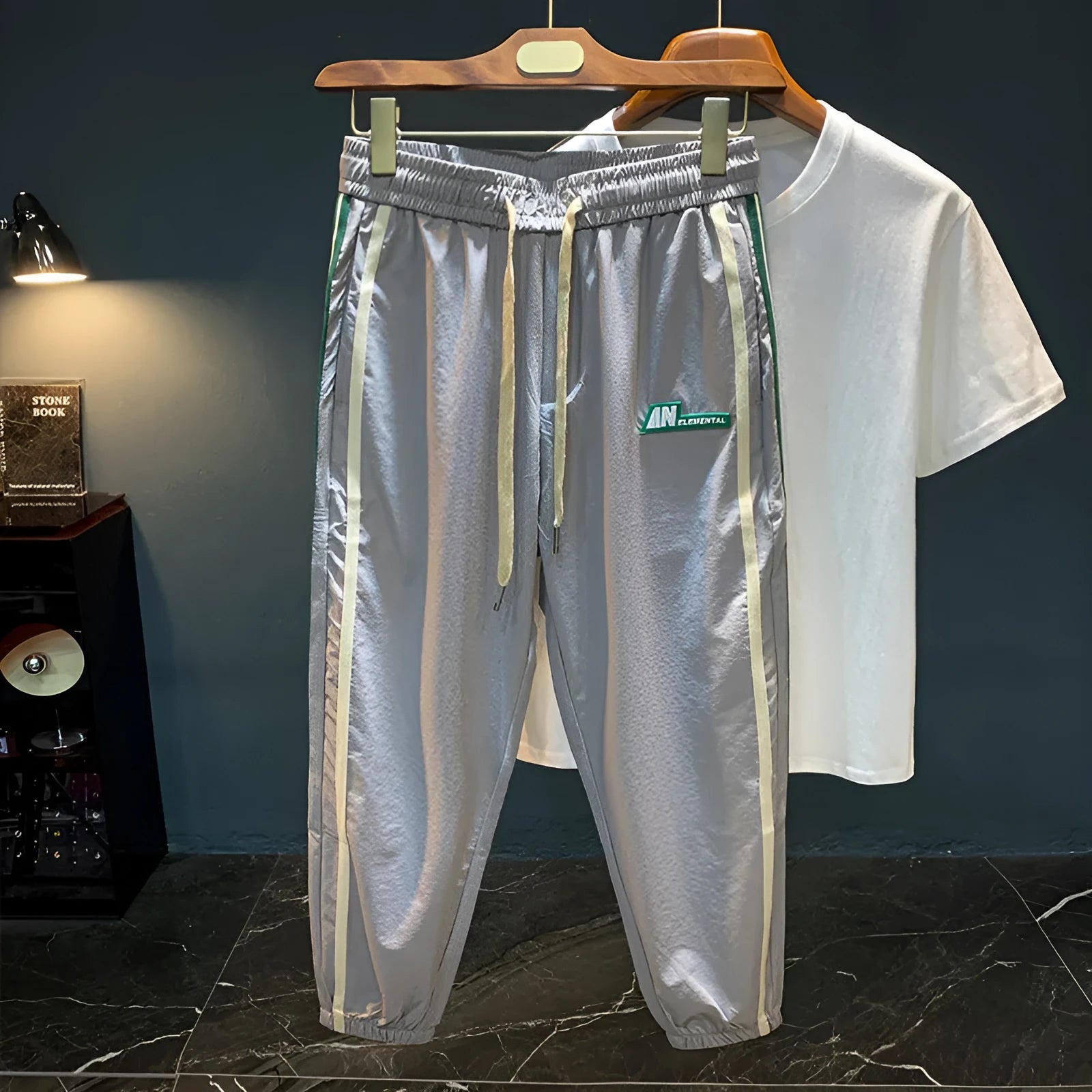 Men's black and grey ice silk harem pants showing dropped crotch design and mid waist fit