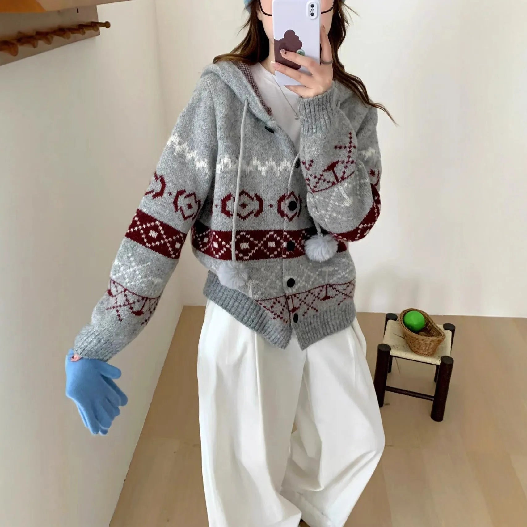Plus size women's grey brocade sweater coat with geometric pattern and long sleeves.