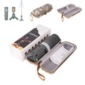 Portable creamy white and dark grey LED camping lantern with push button.