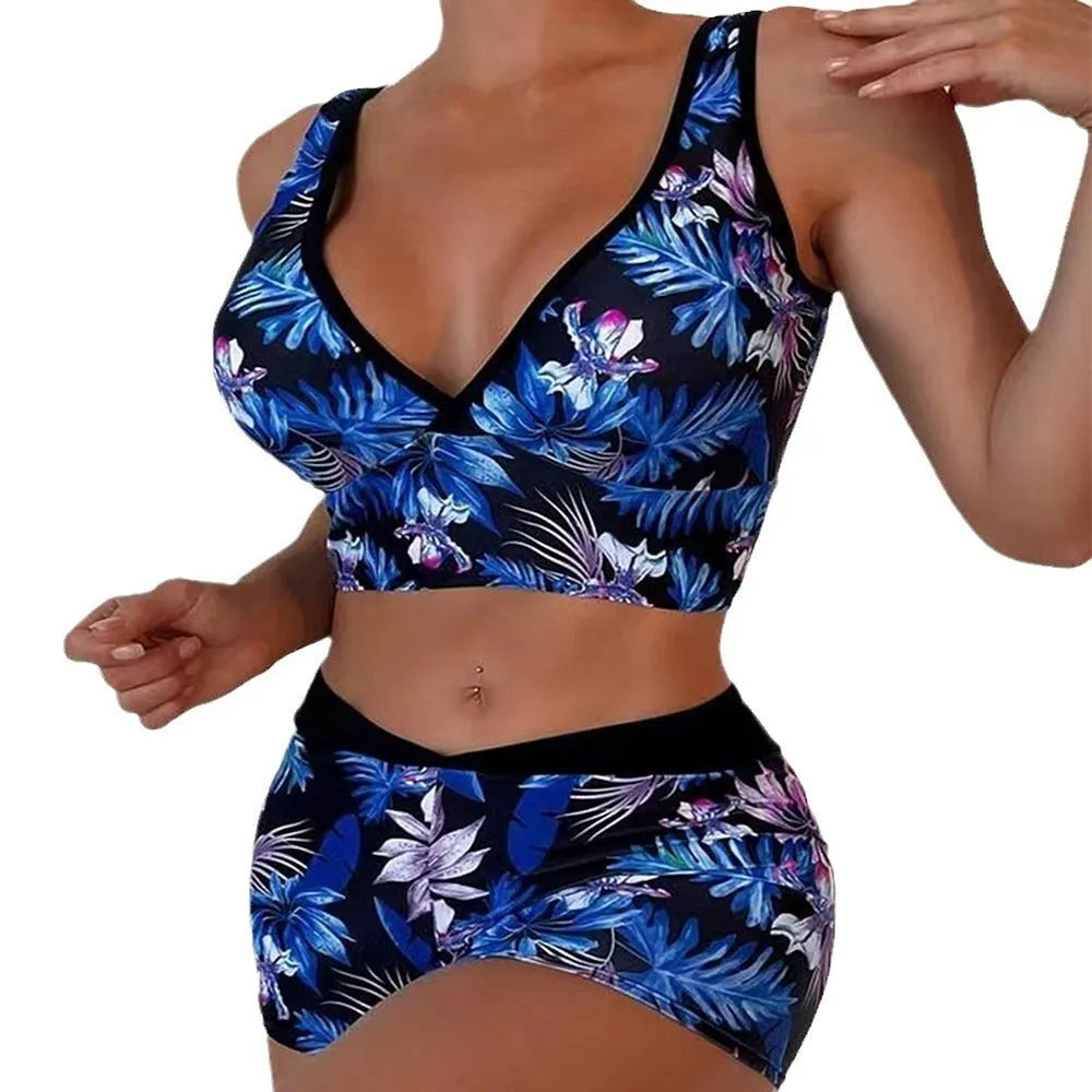 Women's two-piece swimsuit with sleeveless top and printed boxer briefs in multi-colour pattern
