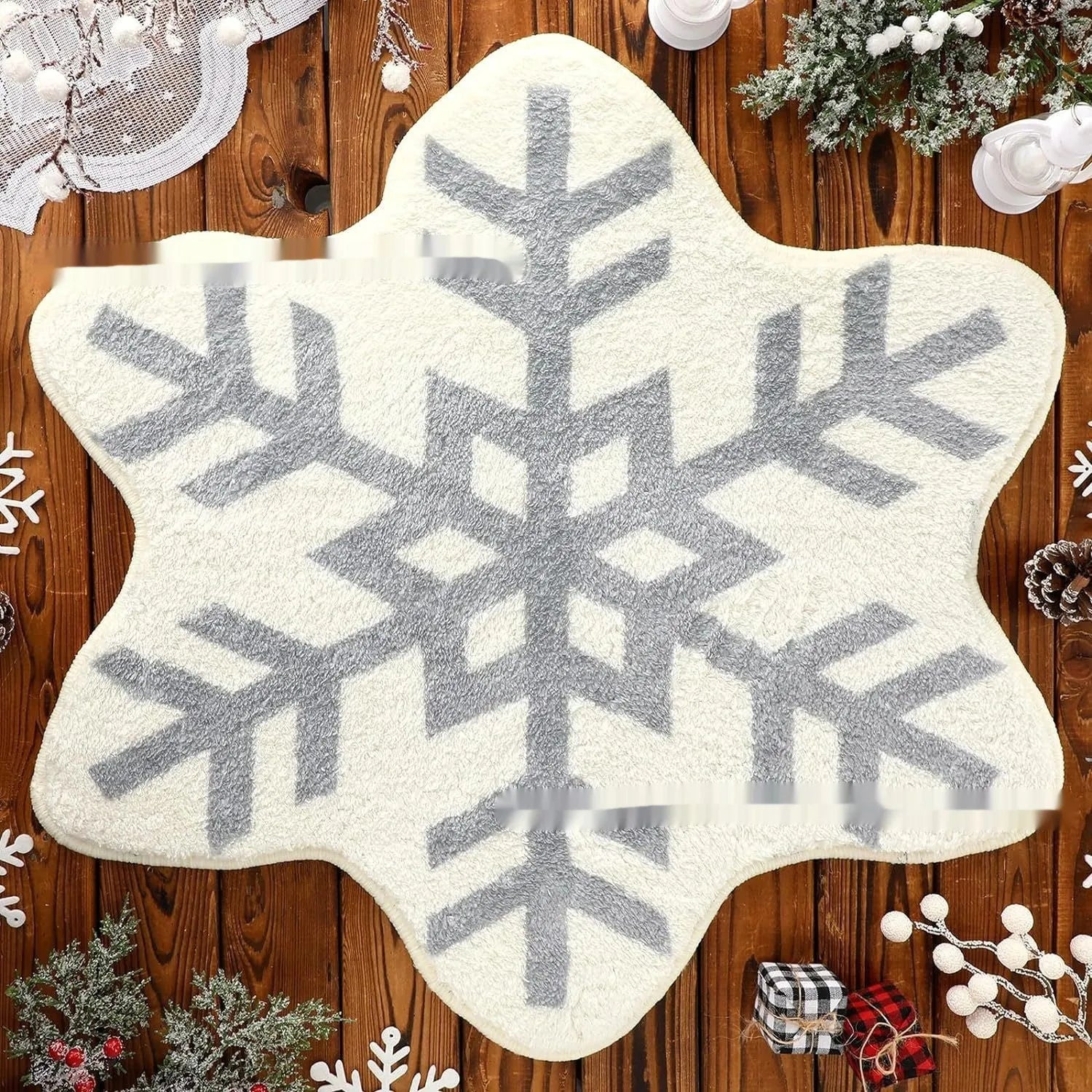 Round red and green Christmas pattern carpet on a wooden floor.