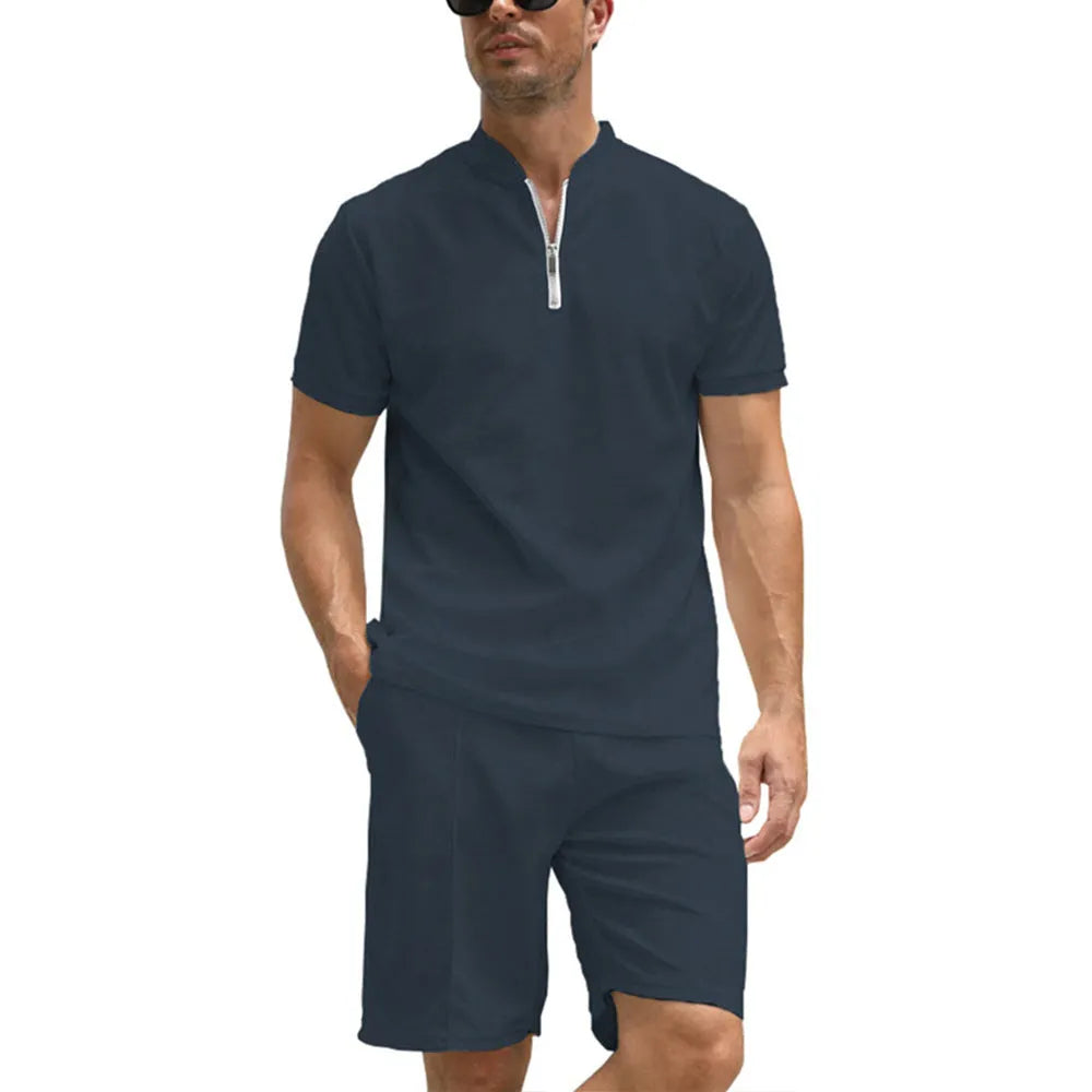 Men's solid colour polo shirt and trouser two-piece set in beaded bird's eye polyester fabric.