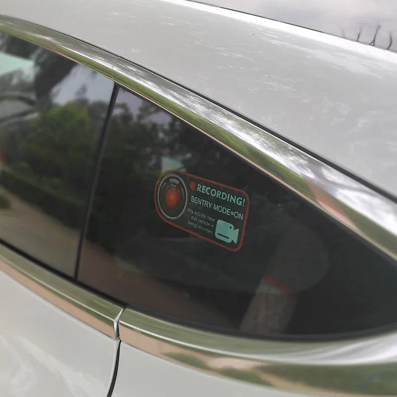 Tesla Sentry Mode warning stickers measuring 11x5 cm with electrostatic adhesive backing