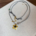 Ethnic flower pendant necklace with stone shell beads on alloy chain in silver black red colours