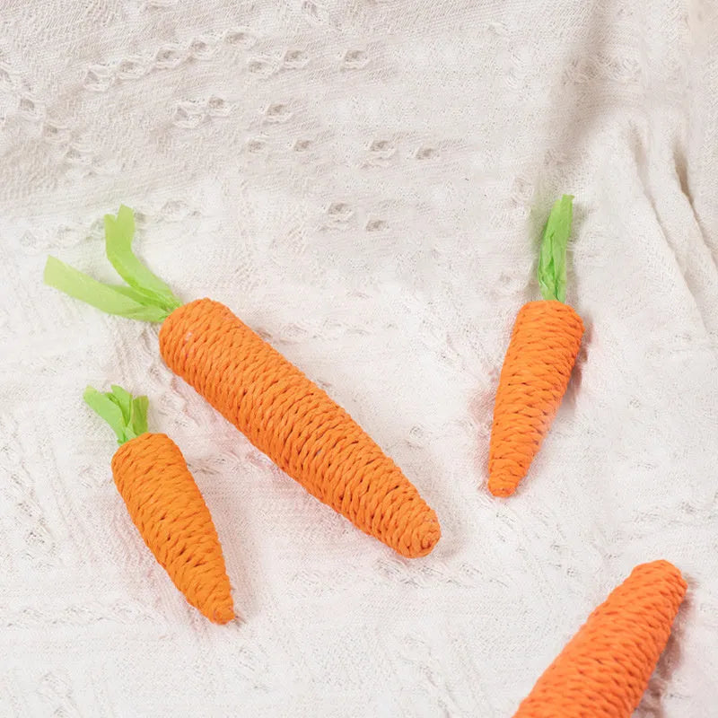 Bundle of cat toys including carrot-shaped paper bites, ringing stones, slender cat sticks and tooth grinding chews