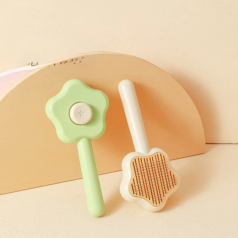 Self-cleaning cat comb with stainless steel needles, green colour, 20cm long pet grooming tool