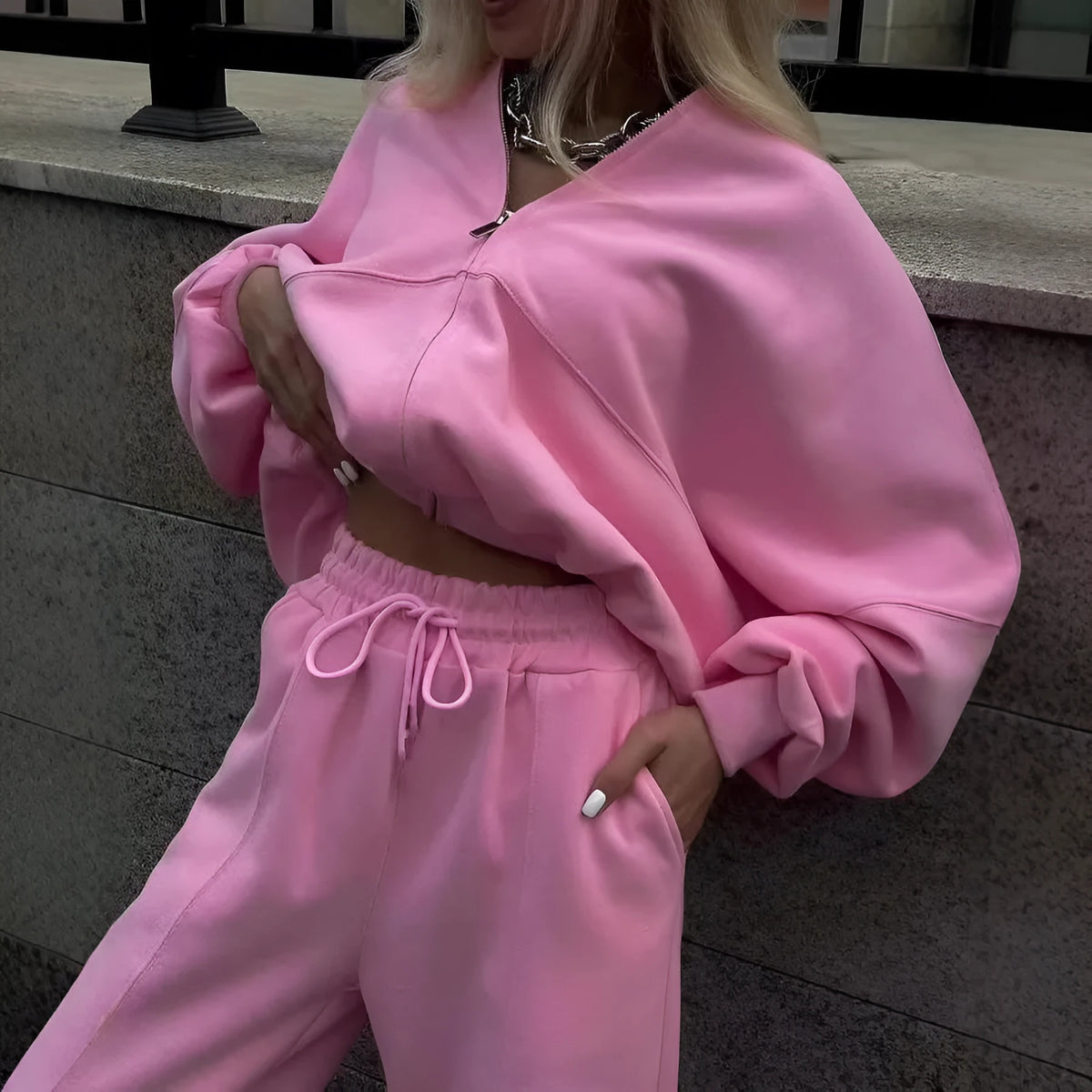 Women's pink cotton blend sweater and cropped pants two-piece set with collar stitching detail
