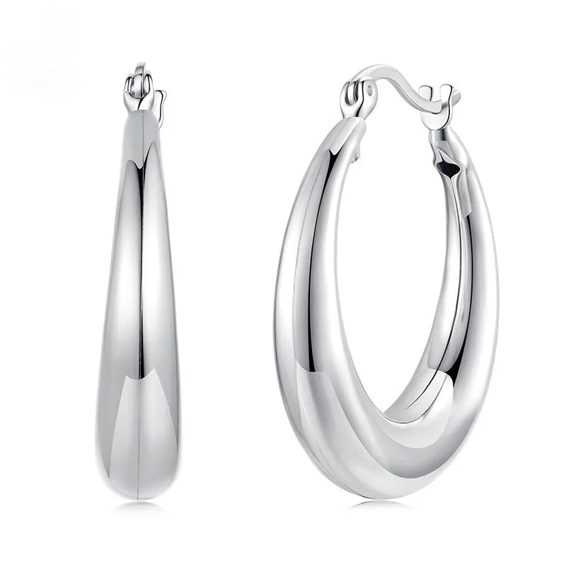 Geometric ring design ear clip earrings in copper alloy with silver needle fastening