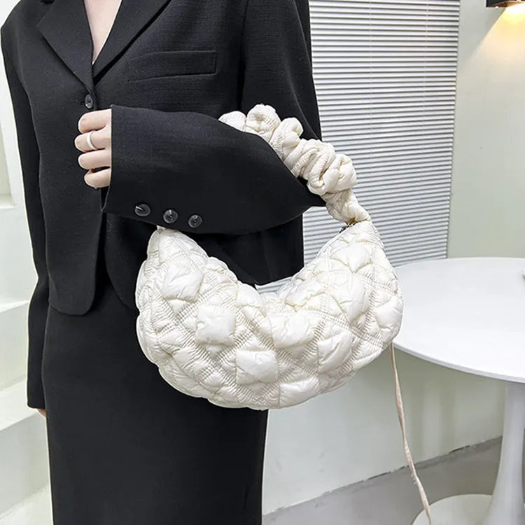 Women's simple nylon cloud underarm messenger bag in a solid colour with an adjustable shoulder strap.