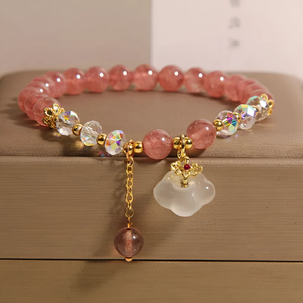 Women's strawberry quartz crystal bracelet with white agate auspicious clouds design