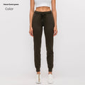 Women's high waist yoga pants with drawstring waistband in distilled coffee colour.