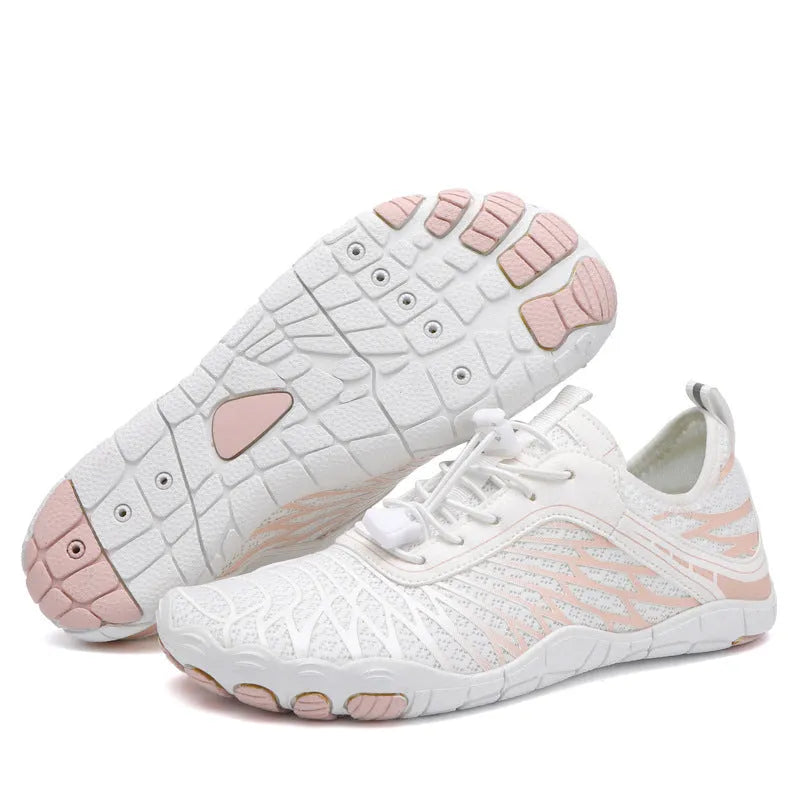 Men's white and ash orange lace-up casual sports trainers with rubber sole on a plain background