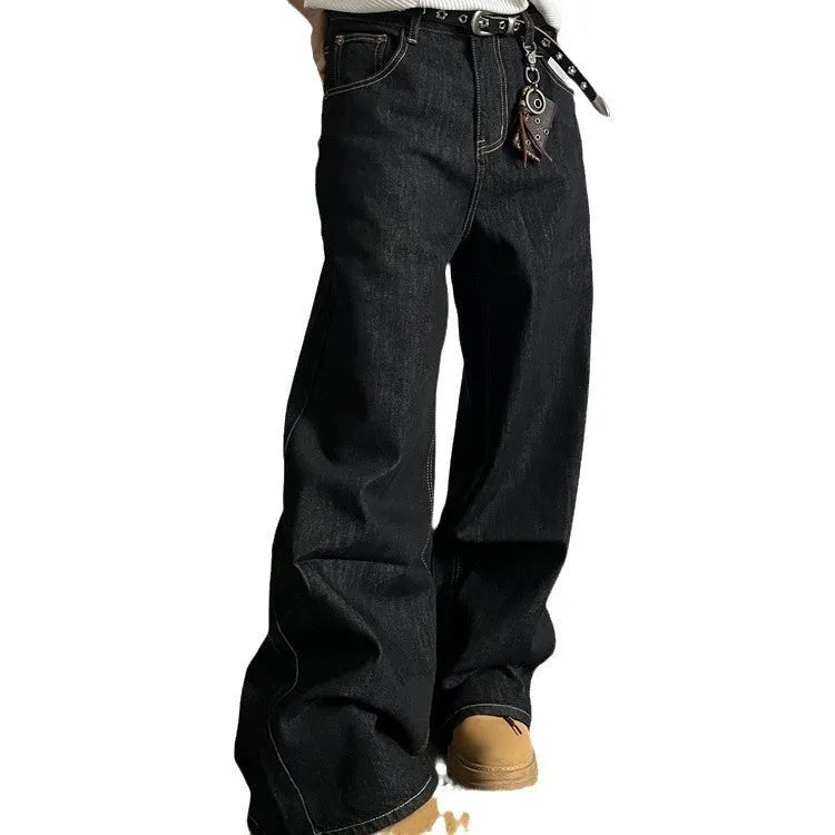 Man and woman modelling black retro wide-leg denim jeans with a straight loose fit.