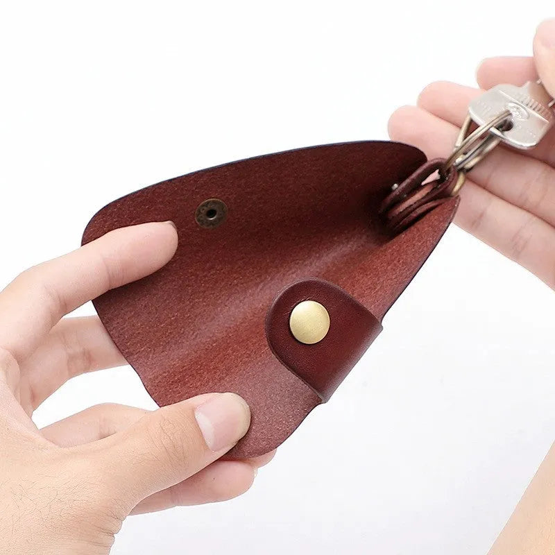 Genuine leather handmade key case in black, brown, coffee, or purplish red.