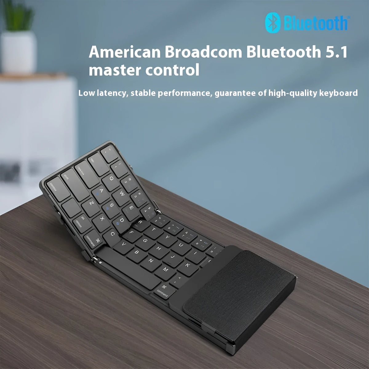 Black folding Bluetooth keyboard for tablets with silent membrane keys showing touchpad variant