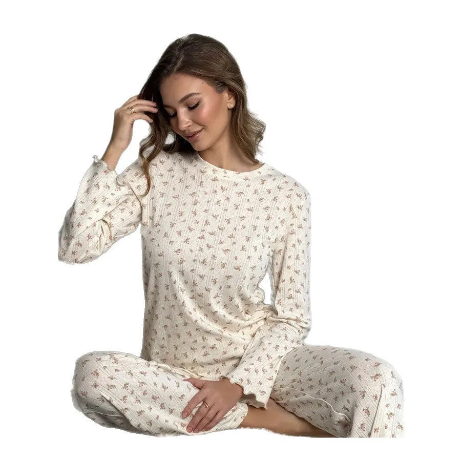 White floral print women's two-piece lounge suit with bell sleeves and wide-leg trousers