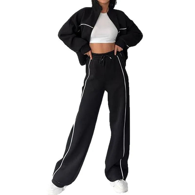Casual striped suit set comprising a long sleeve mock neck hoodie and matching lace-up trousers.