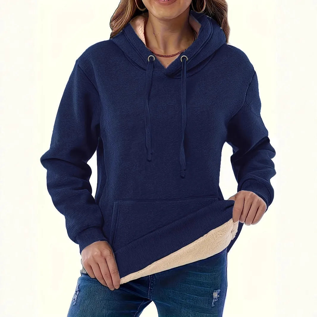 Women's black loose fit hooded sweater with pockets and long sleeves laid flat.