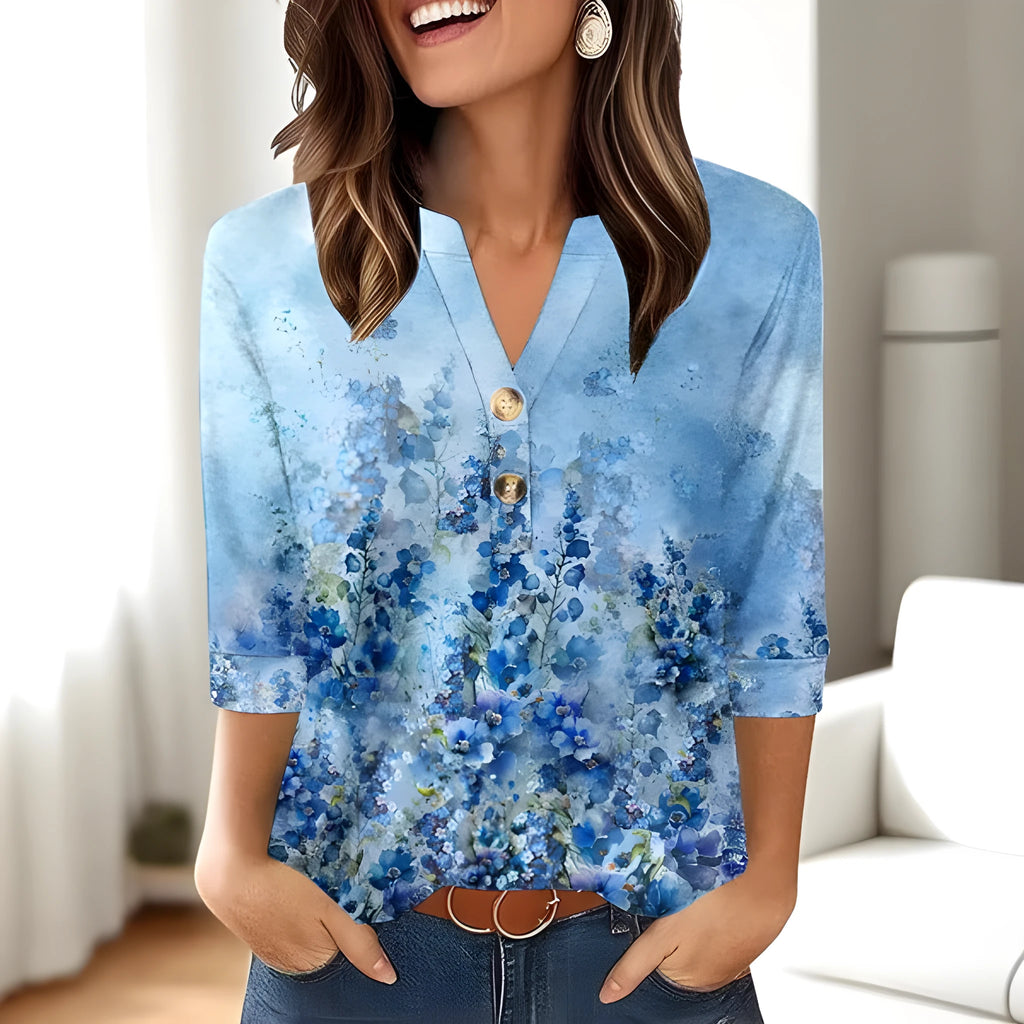 Women's loose V-neck casual top with a 3D printed pattern, shown in a solid colour.