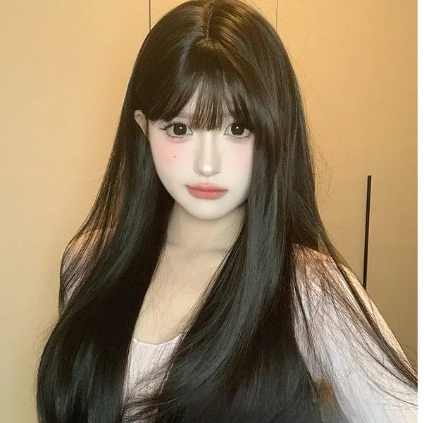 Dark brown long straight synthetic wig with bangs on wig head
