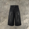 Men's black denim shorts with flame embroidery patch on straight leg cropped design