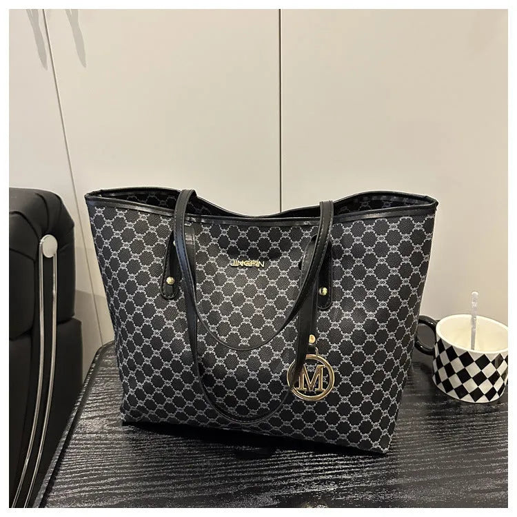 Black PU street style shoulder bag with visible stitching, shown next to grey, white, and brown colour options.