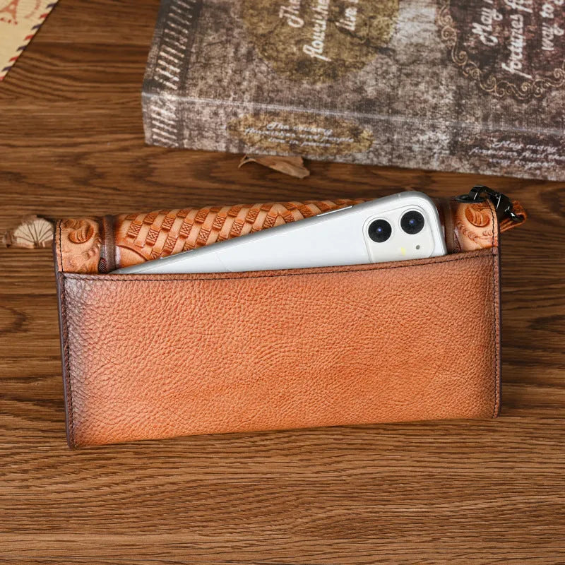 Chinese-style floral embossed tri-fold leather wallet in retro brown showing opened compartments