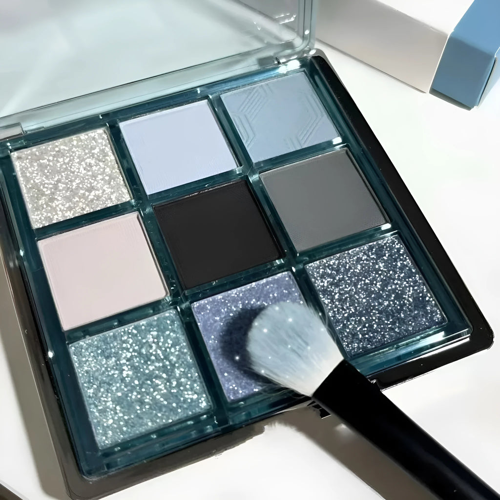 MUGELEEN nine-colour eye shadow palette showing low saturation blue and smoked shades