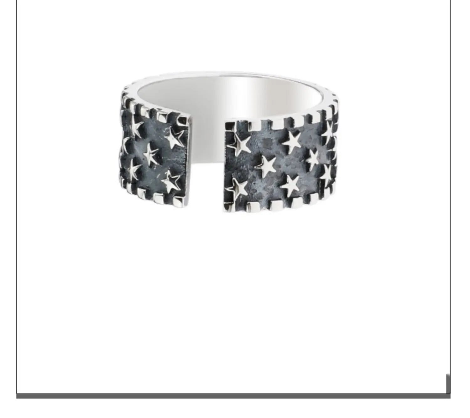 Adjustable silver ring with a multi five-pointed star geometric pattern.