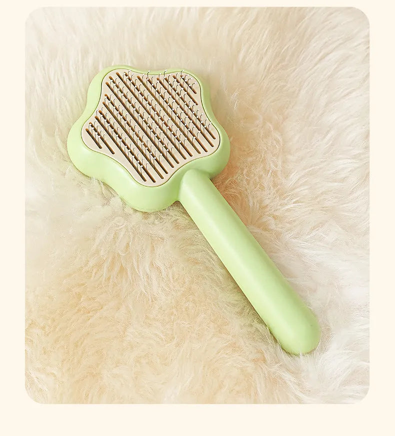 Self-cleaning cat comb with stainless steel needles, green colour, 20cm long pet grooming tool