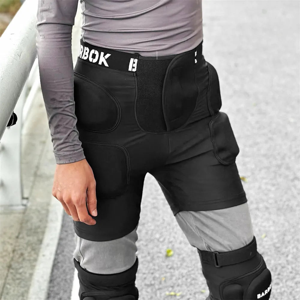 Black skating hip protection trousers with NBR foam padding for fall prevention