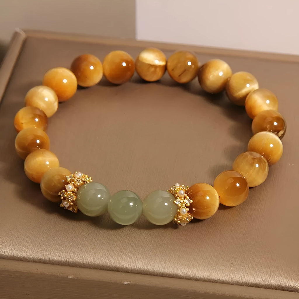 Natural yellow Tiger's Eye Hetian Jade bracelet with symbolic Chinese patterns in U-shaped design