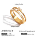 Geometric stainless steel zircon ring on a grey background showing European and American style.