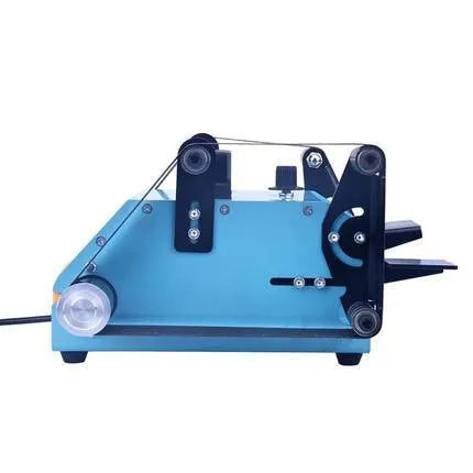 Blue desktop dual-axis belt sander on a workbench for knife sharpening and polishing