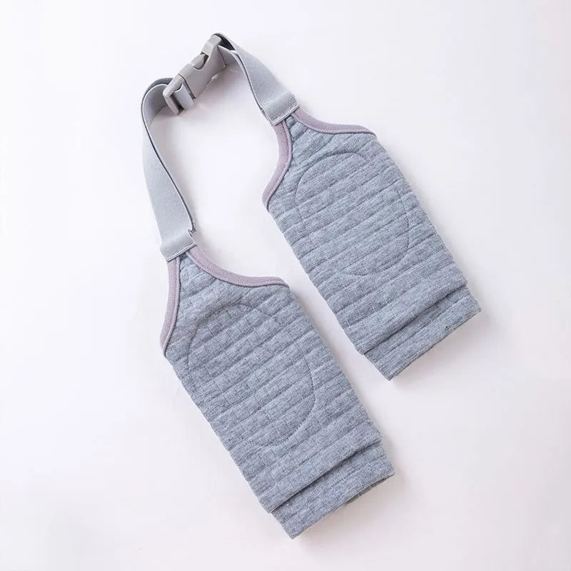 Blue dog knee protector with extra-thick padded elbow patch and adjustable buckle, shown with matching scarf