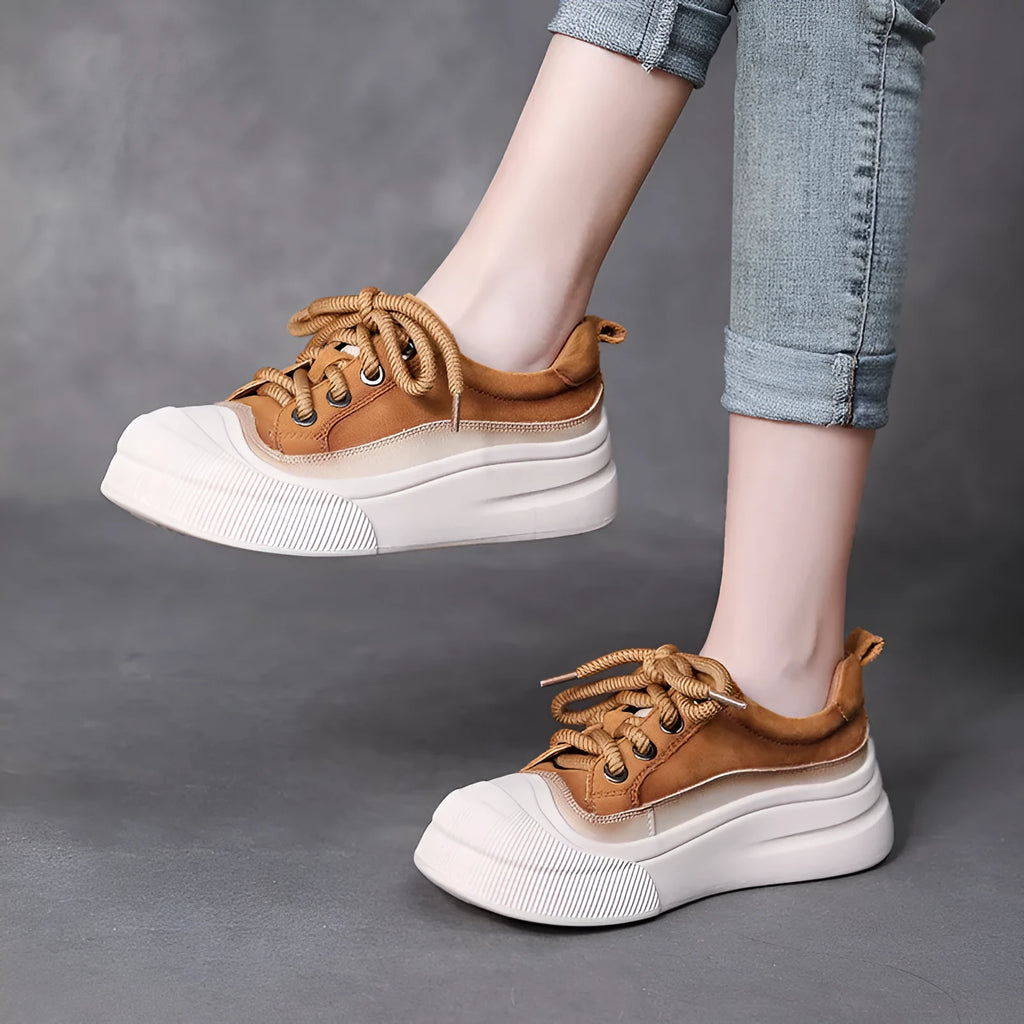 Women's brown leather lace-up casual shoes with round toe on white background