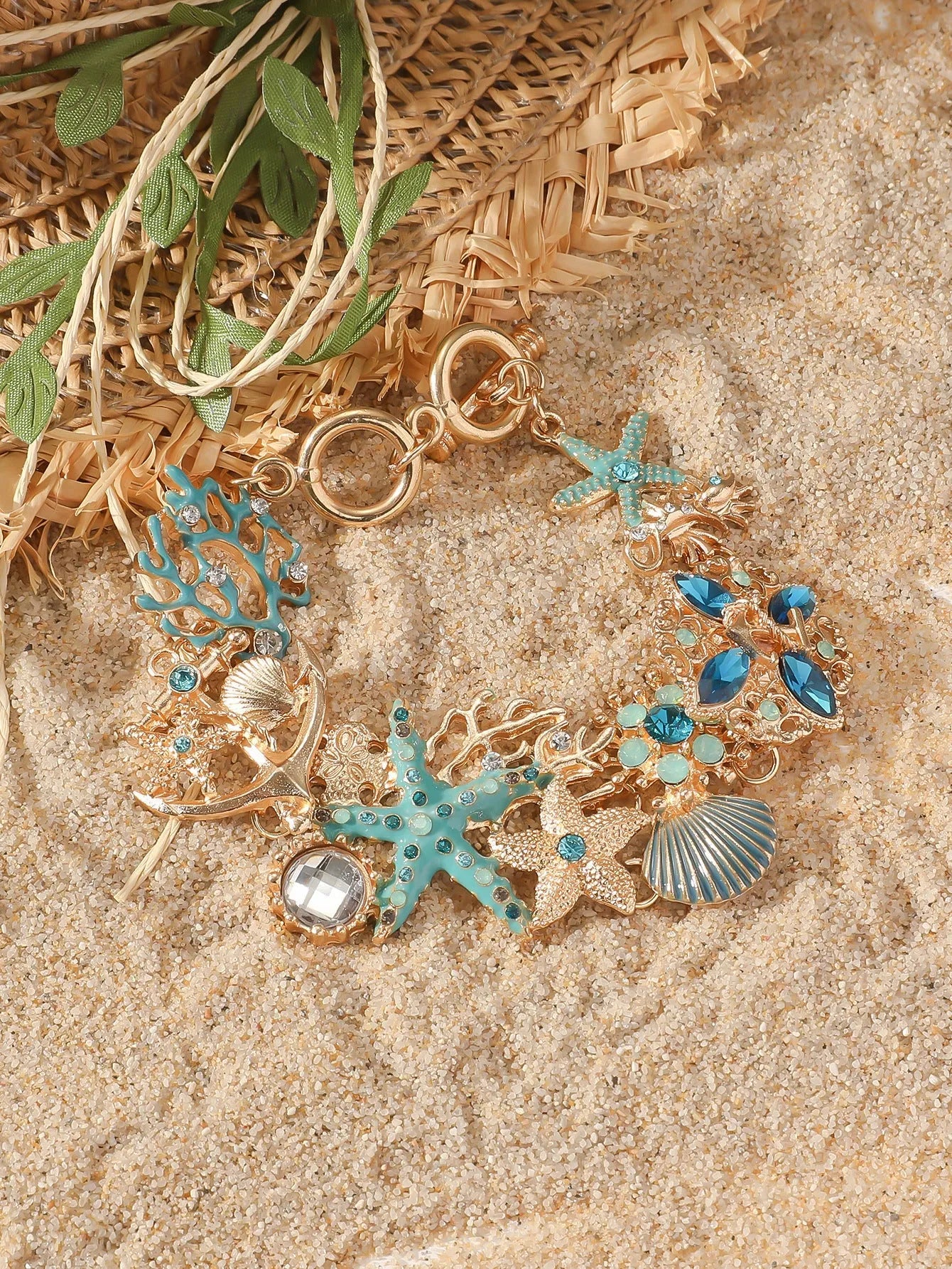 Alloy rhinestone bracelet with marine boat anchor design and starfish elements in turquoise finish