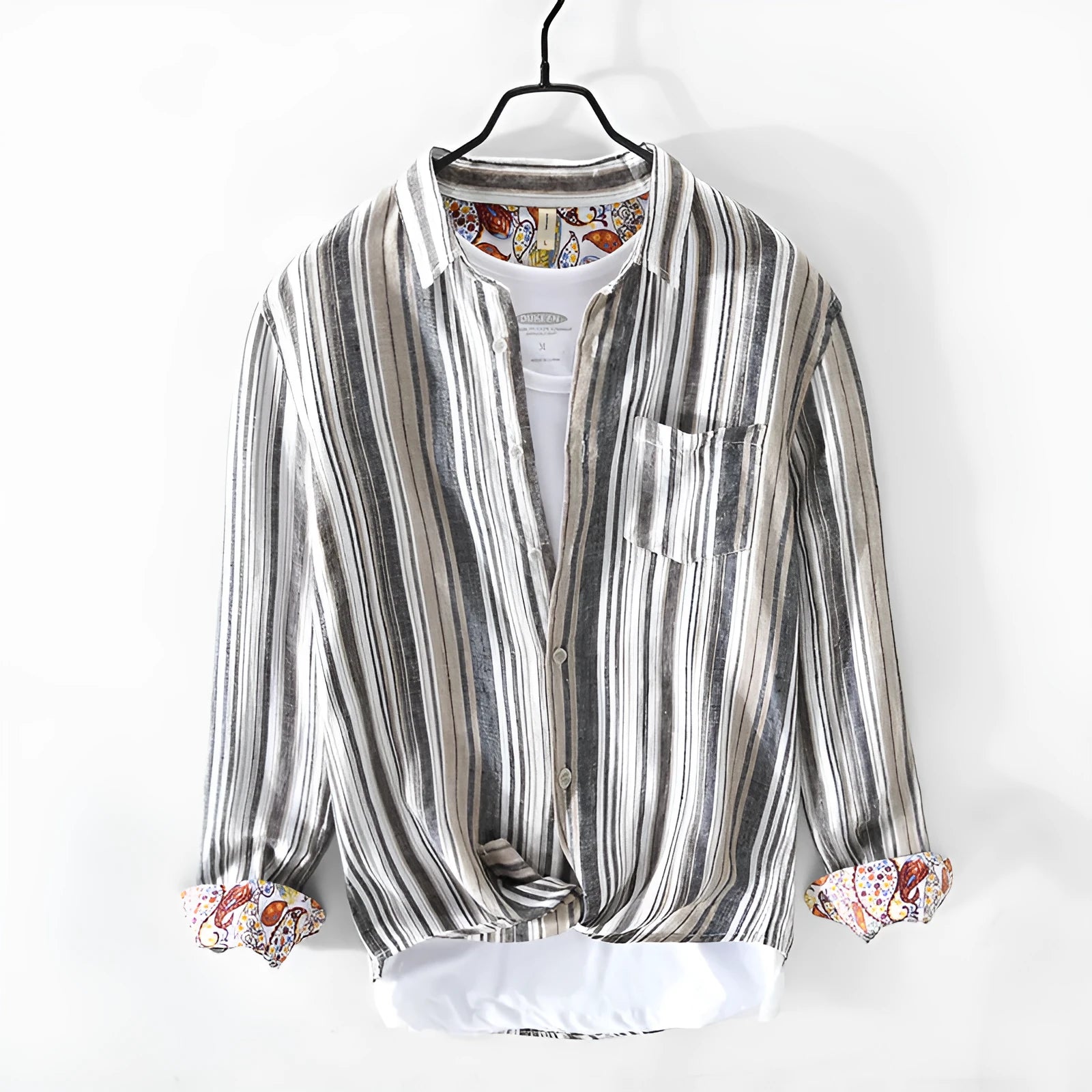 Men's gray striped linen shirt with long sleeves and loose fit on a hanger