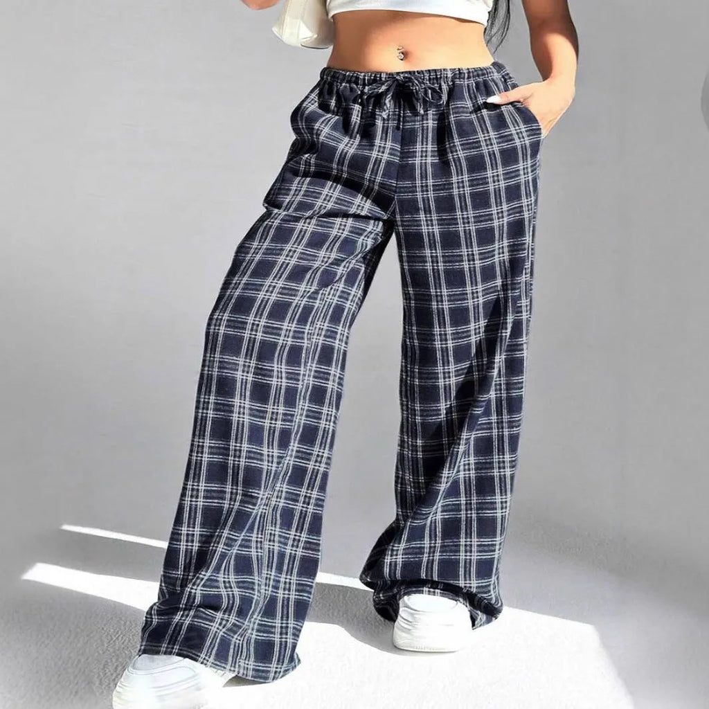 Women's loose fit plaid trousers with drawstring waist and side pockets in polyester fabric