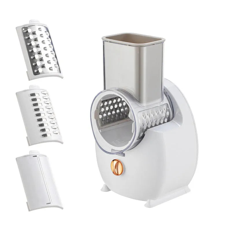 White electric vegetable slicer with suction base and multiple blades for potatoes and carrots