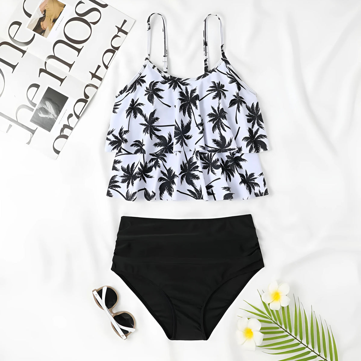 Black women's high waist swimsuit with a white coconut tree floral print on the briefs.