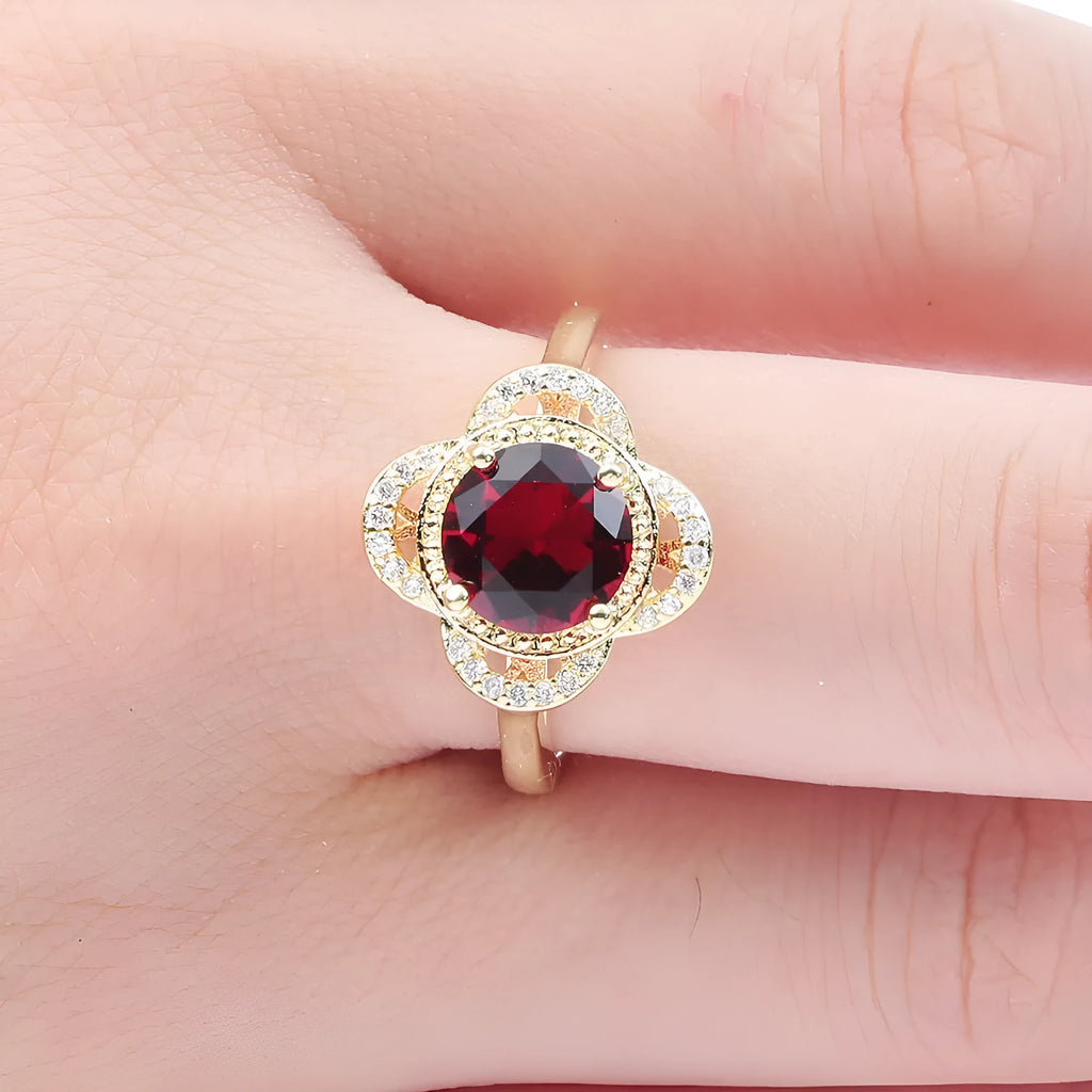 Copper ring with zircon stone inlaid in a fruit-shaped design.