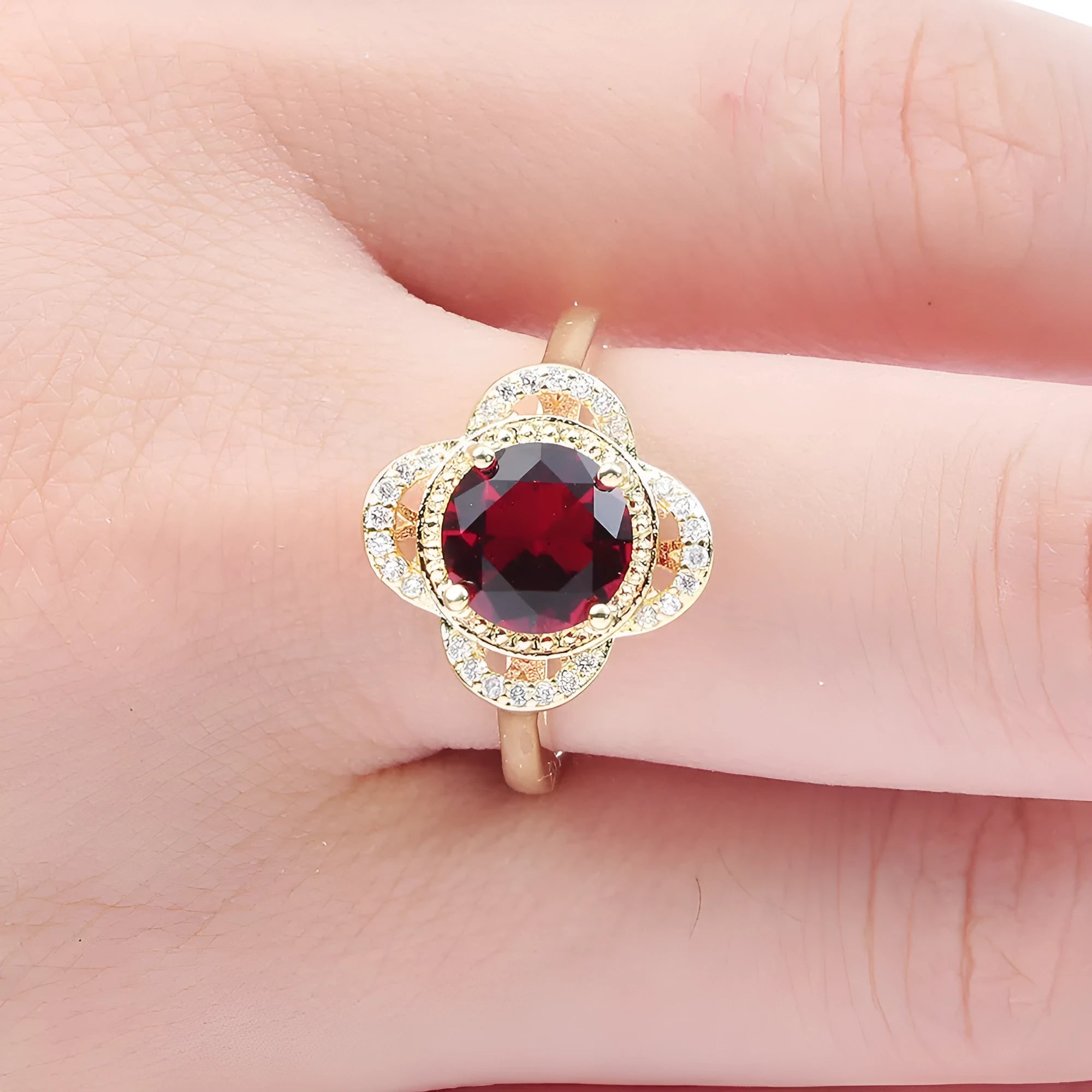 Copper ring with zircon stone inlaid in a fruit-shaped design.