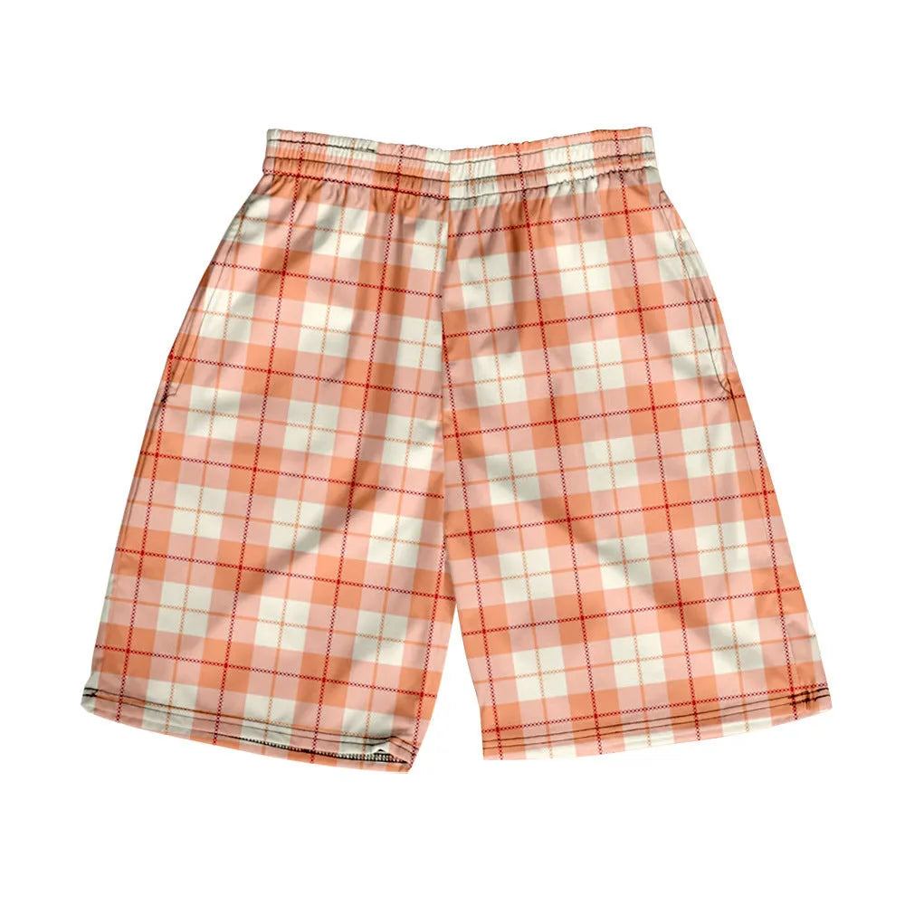 Man wearing plaid patterned casual shorts with an elastic waistband, straight legs, and a digital print design.