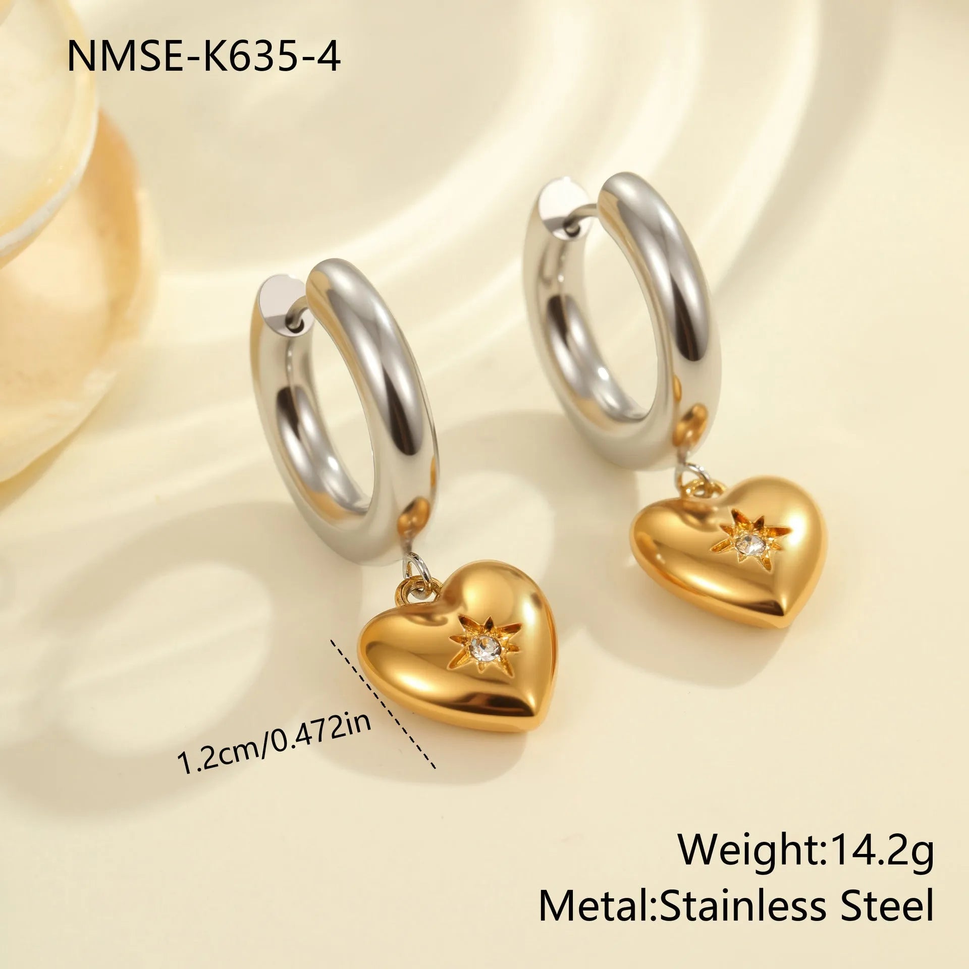 Christmas tree heart earrings in stainless steel with 18K gold plating showing star and geometric shapes