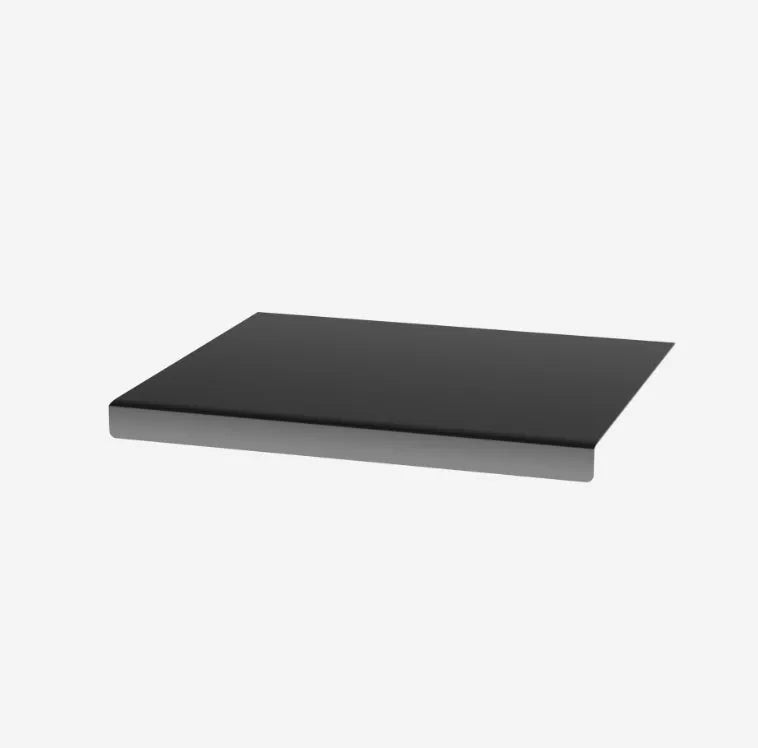 Transparent acrylic cutting board with anti-slip base on a kitchen counter