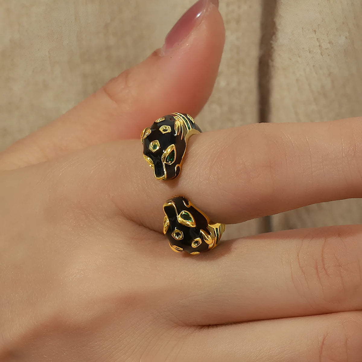 Women's copper geometric open ring with black electroplated cheetah pattern, shown in size 7.