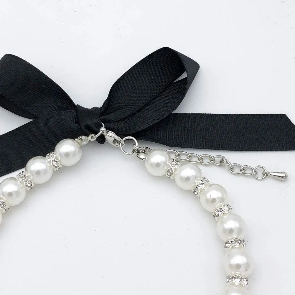 Adjustable pearl and rhinestone necklace with ribbon bow for small dogs and cats