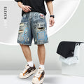 Blue ripped men's denim shorts with graffiti design, showing straight leg and zipper fly.